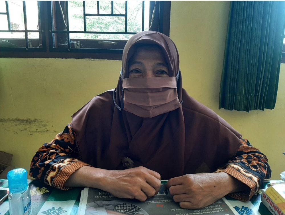 Kepsek SDN 13/I Muara Bulian Dwi Yanti Marlina
